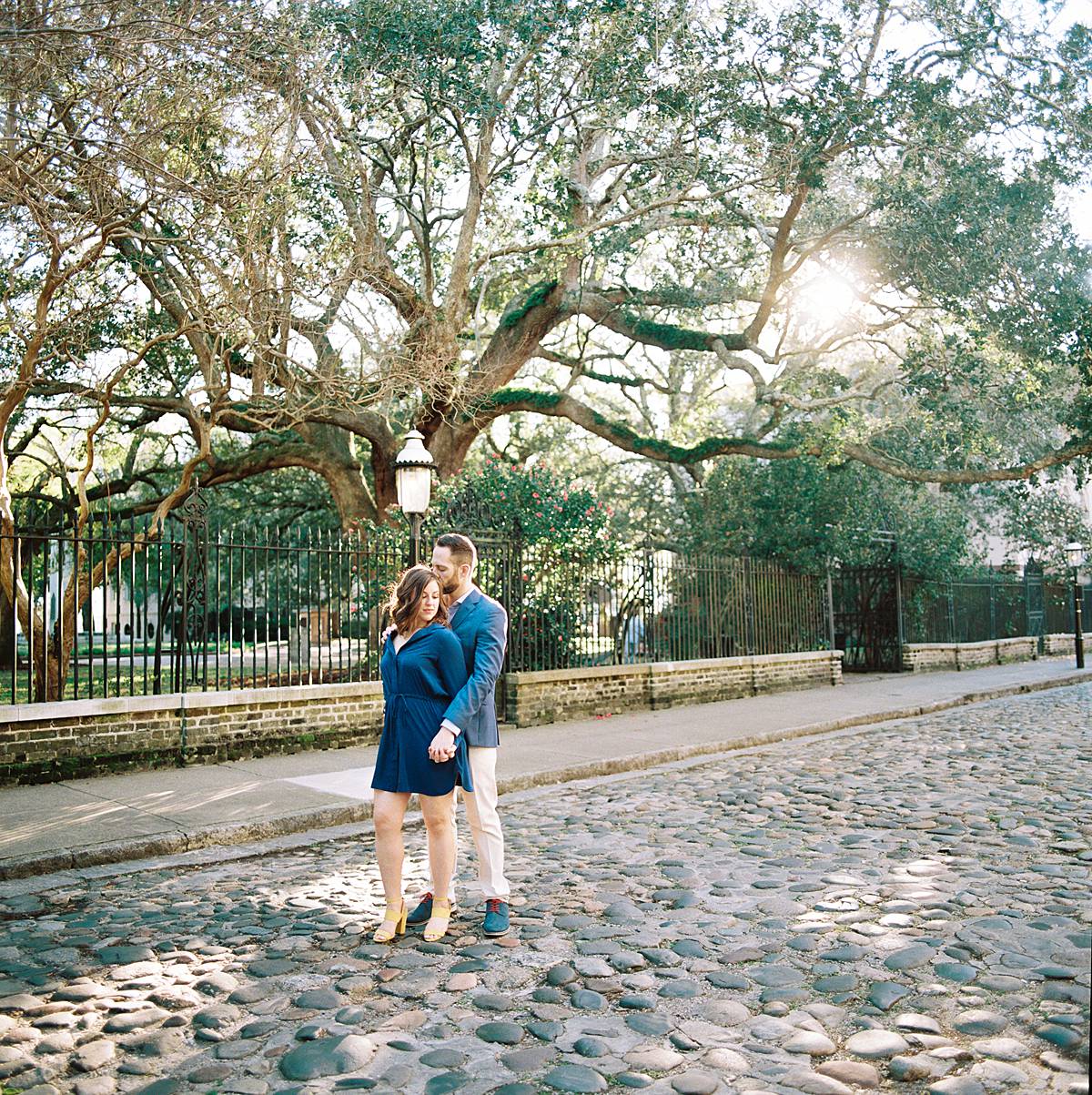 hasselblad FE 50mm f2.8 engagement portrait from hasselblad 202fa on chalmers st in charleston sc